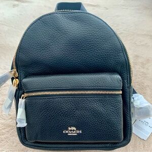 Coach Black Leather Backpack with Gold Details